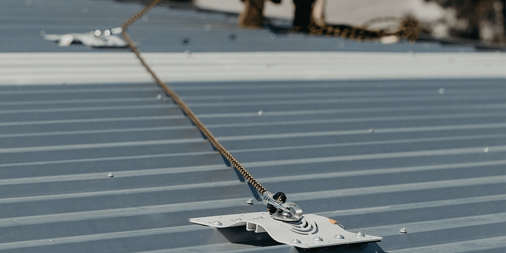 worker using a safety roof anchor points system