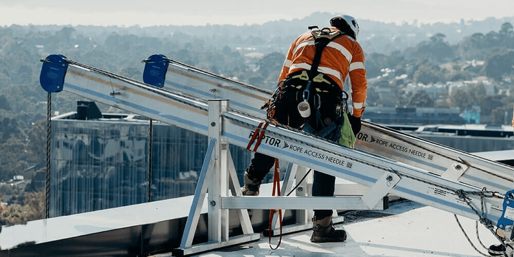 abseiler about to access the high rise building facade